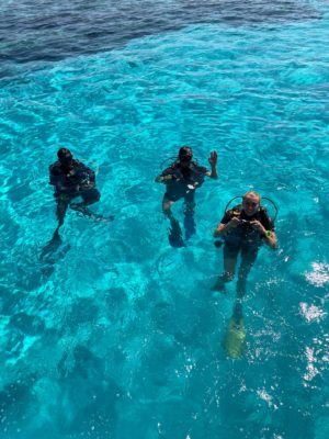 Setting up for a scuba dive in the ocean