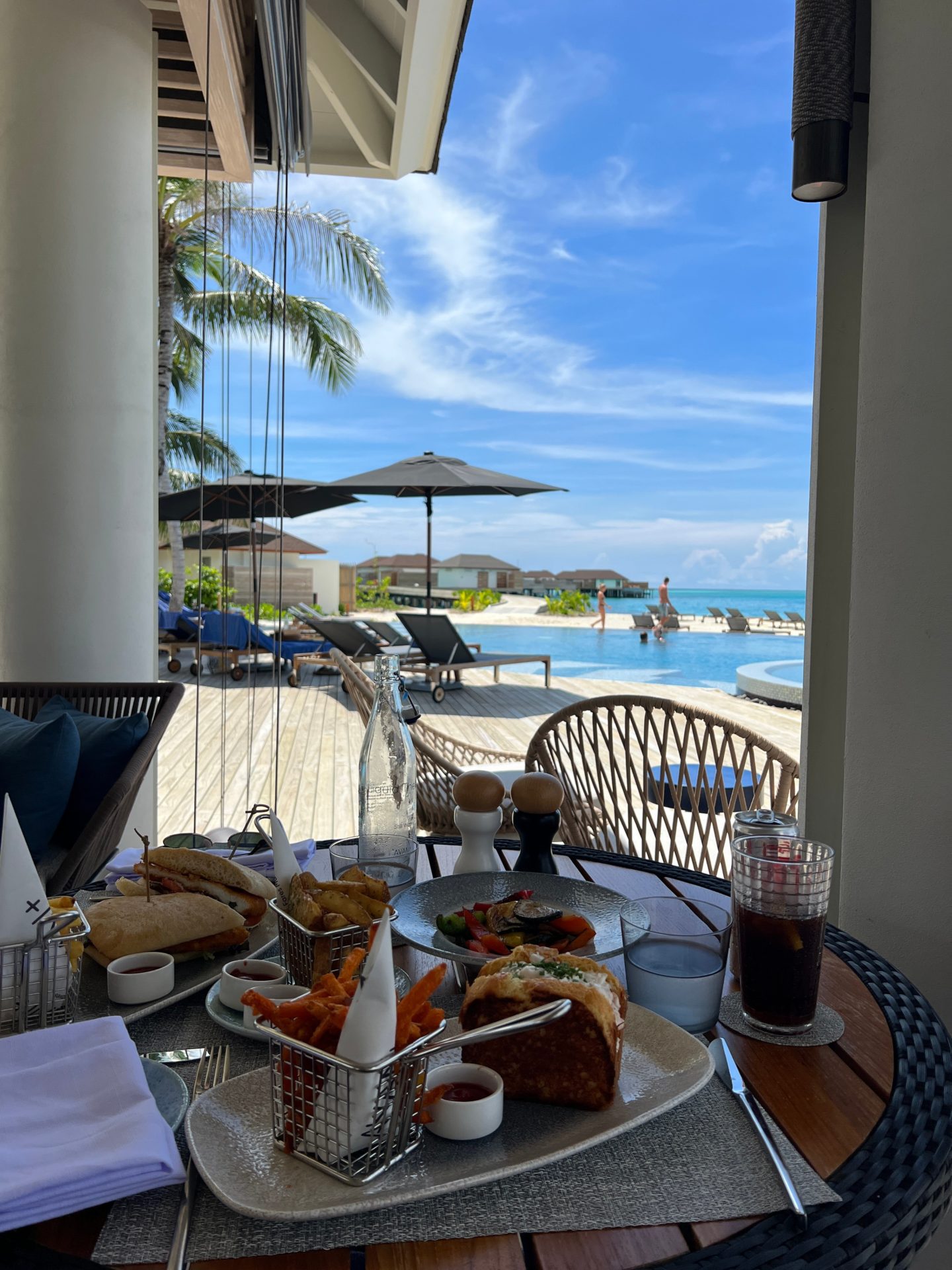 Lunch served at a Maldivian resort looking out across the pool and sea