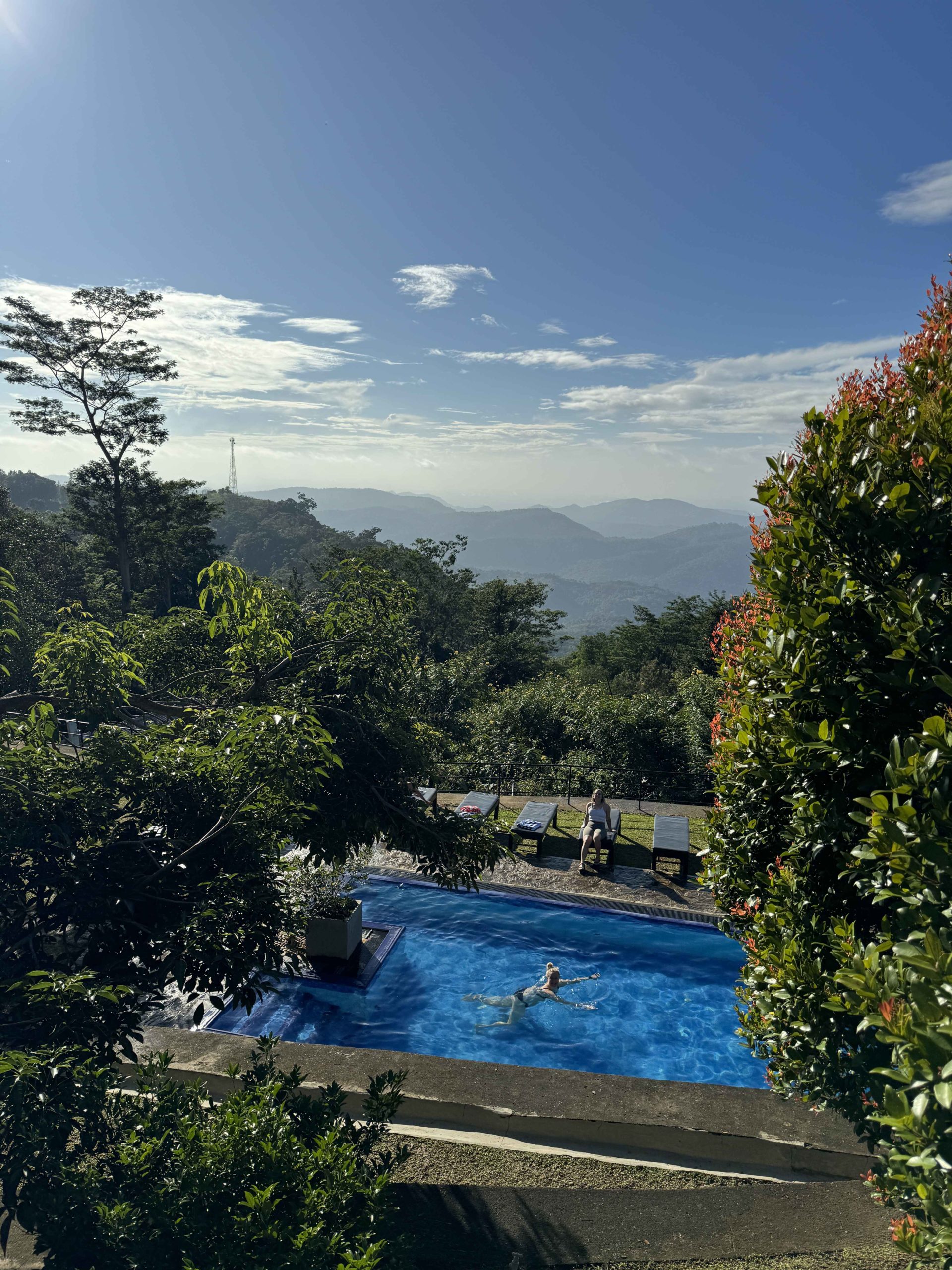 A view over a pool and the Sri Lanka skyline