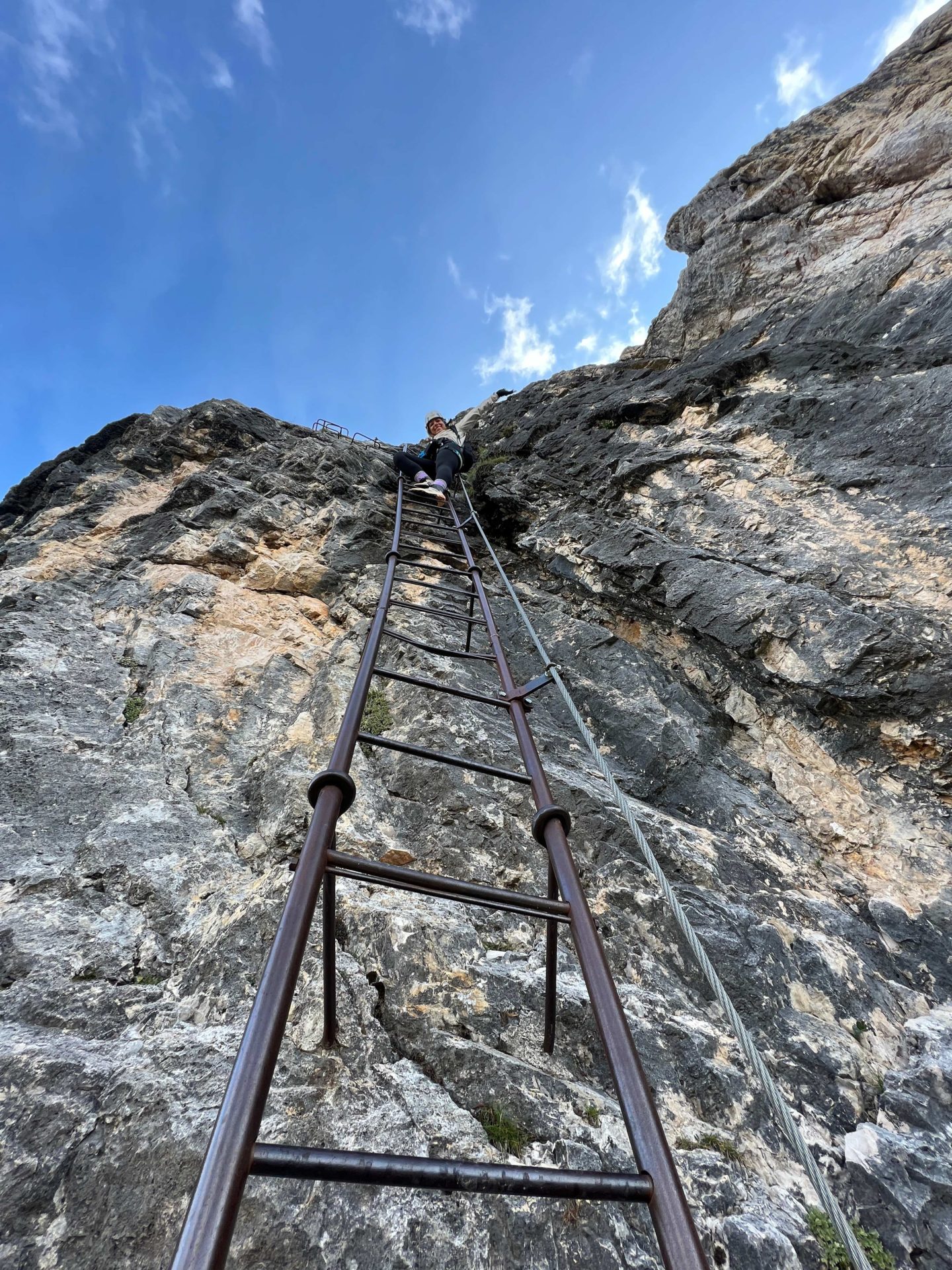 A via ferrata and ladder up a mountain in the Dolomites